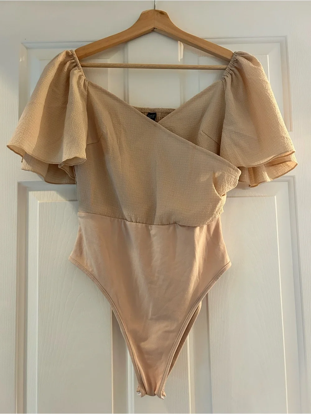 Emery Rose Cream Body Suit